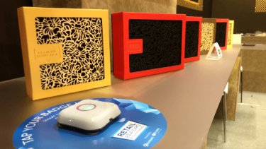 smart device for scanning badge is on the table 